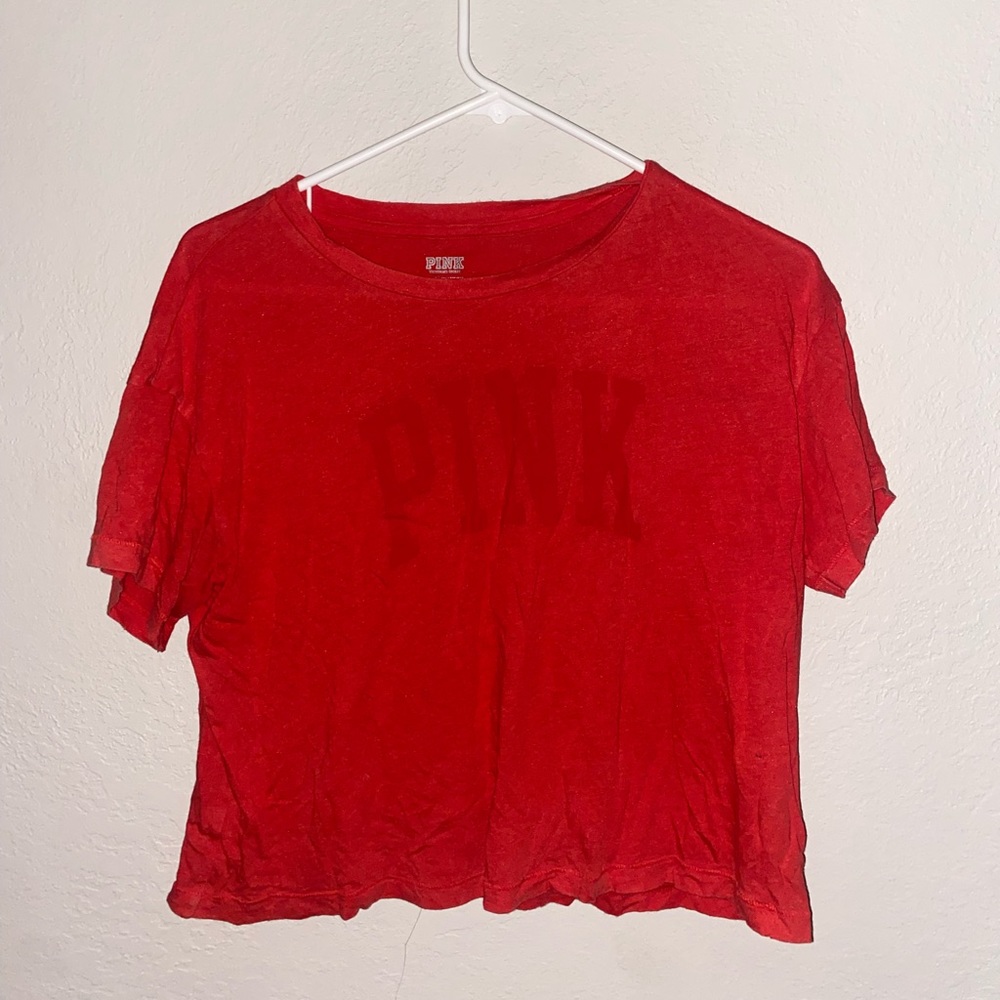The brand is Victoria’s Secret, size is a XS in kids. Red